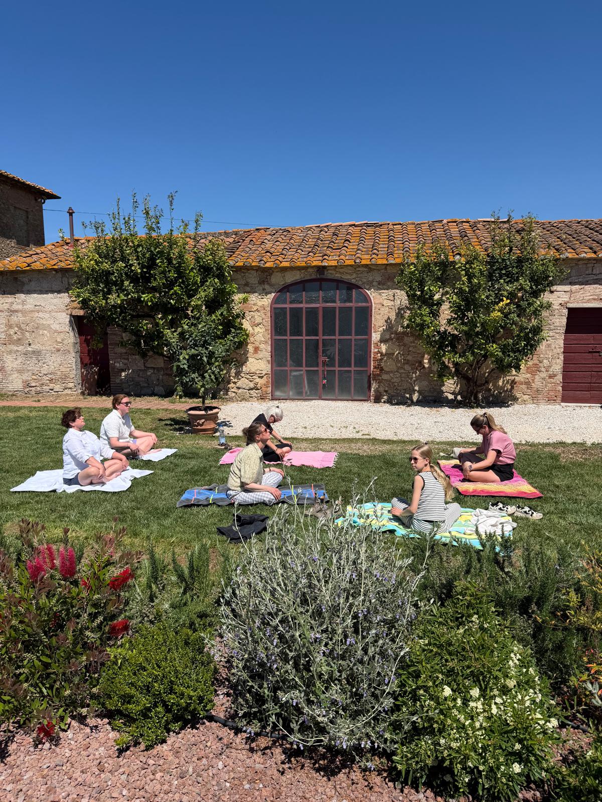 Private yoga session under the olive trees